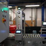 CS1-Scanner bei Folienprüfung auf Förderband